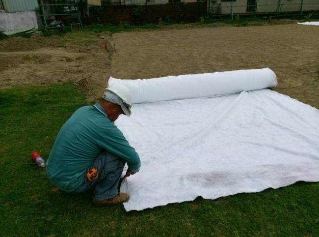 10. Laying geotextile on