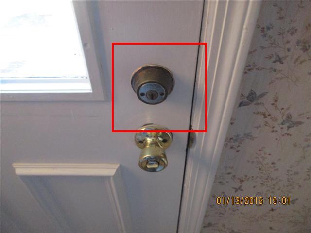 2.1 DOORS (Exterior) Comments: (1) The rear door has a double keyed lock, this is a safety hazard. Have this replaced by a locksmith with the correct lock. 2.