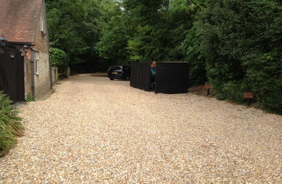 private drive is 3 mtrs away from the entrance gate. The drive is shingle on gravel and after that the access to the front door is on level concrete and level decking.