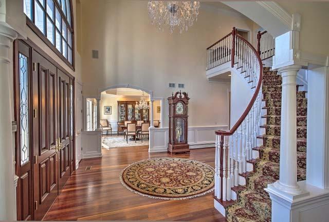 curved staircase and molding.
