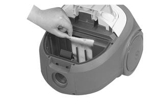 The pre-motor filter is located inside the vacuum cleaner body behind the dust bag. Check when changing the dust bag and replace when dirty.