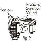 - On the bottom of the base unit there is a pressure sensitive wheel (Fig.