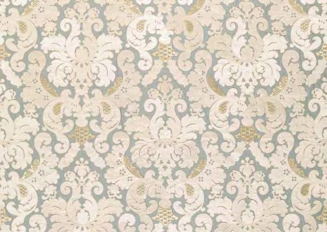 was developed from a fragment of an early indigo wax resist design. The Colefax design studio has created a lively trailing repeat capitalising on the individuality of the leaves and motifs.