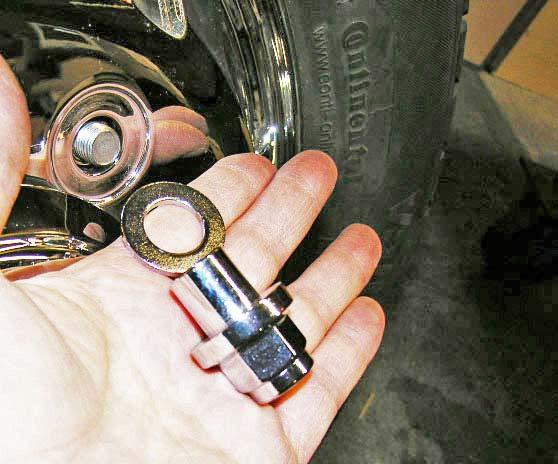 Once the vehicle is prepared for stylized wheel installation, use the chrome washer, chrome lug nut, and chrome adapter with lug wrench to re-install the stylized chrome wheel.
