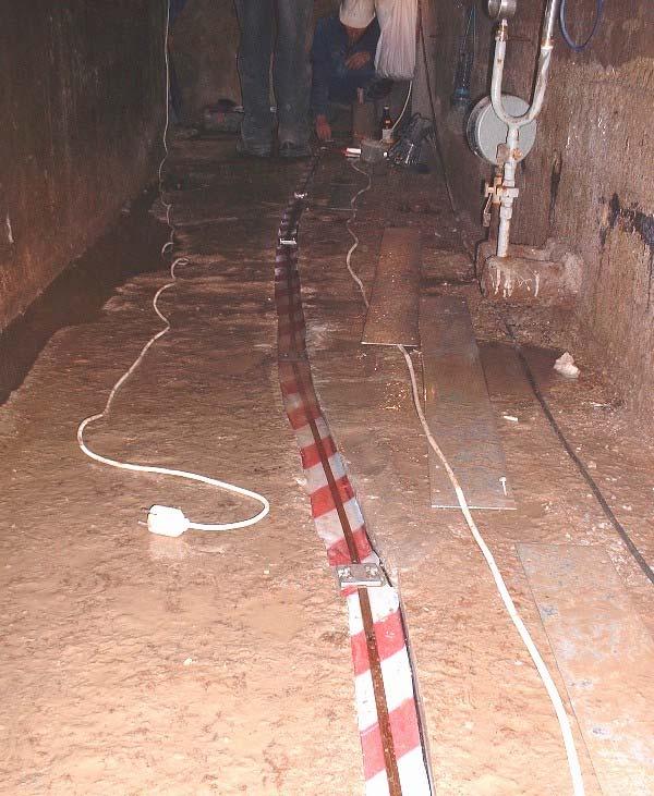One of the dam inspection galleries coincides with a system of three bitumen joints that connects two separate blocks of the dam.
