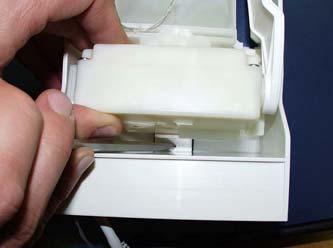 below Gear motor Ice cube tray Temperature sensor Overflow lever Gear