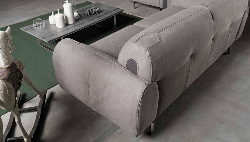 Gotham A leather sofa with polished steel feet with seats and backrests upholstered as one, featuring a single topstitch in between.