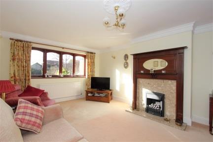 The property comprises two reception rooms, a kitchen/diner, conservatory, utility room and WC on the ground floor,