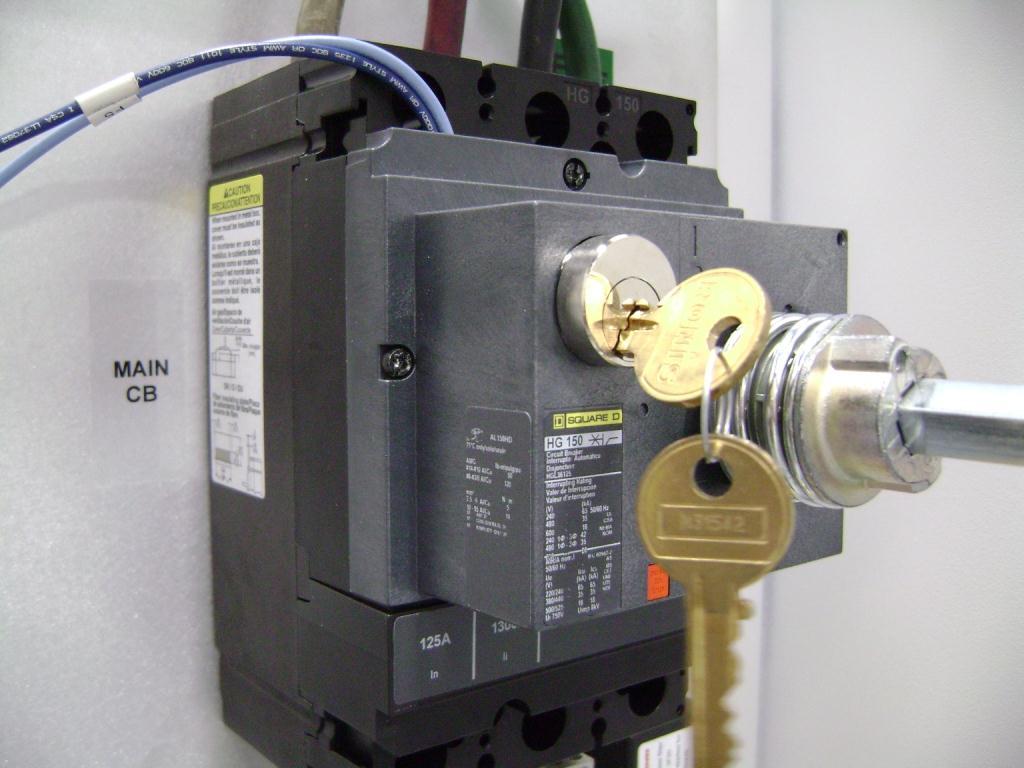 3. Insert key and unlock the rotary disconnect lock located at the top left of rotary disconnect device (see Figure 2-2). Remove the key. 4.