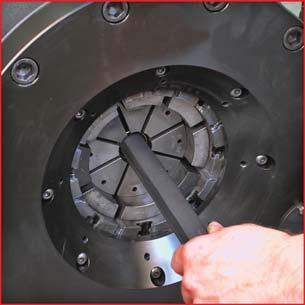 With the Coupling Stop retracted, load the appropriate set of dies and set crimp diameters