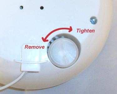 OPERATING INSTRUCTIONS Lift and remove mist nozzle. Remove water tank by grasping firmly and lift up. Turn water tank over and turn the cap counter-clockwise to open.