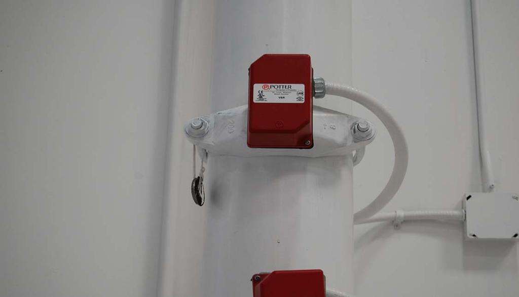 Riser water flow alarm switch A water flow switch is installed in the fire sprinkler riser, when the sprinkler system activates, the water movement in the riser pushes the paddle upwards and