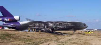 cargo plane lost its right side landing gear and slid off the runway.