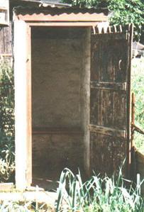 an outside toilet an Anderson shelter a pigeon coop