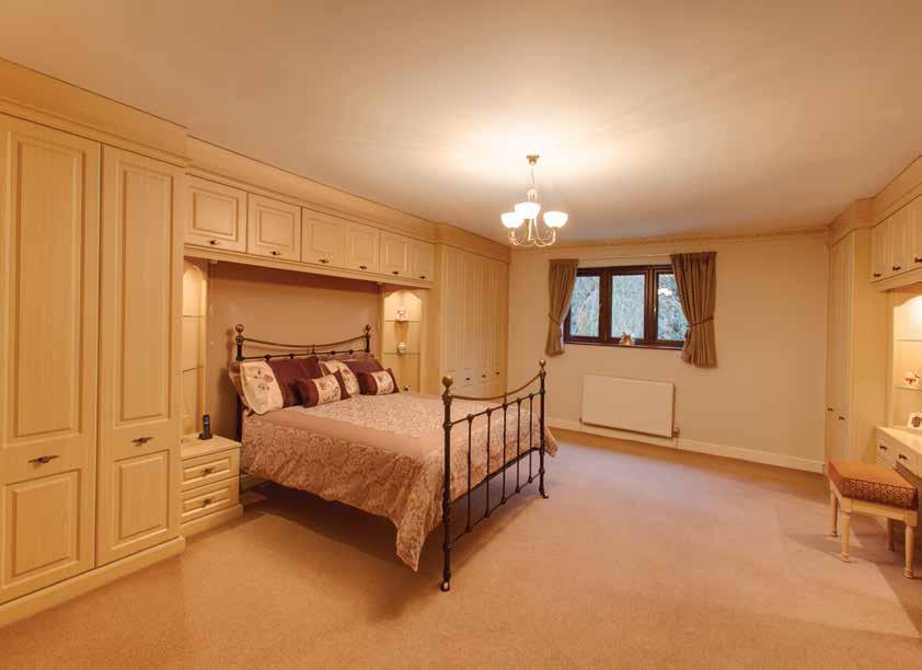 There s a range of fitted furniture incorporating short and long hanging, drawer units, dressing