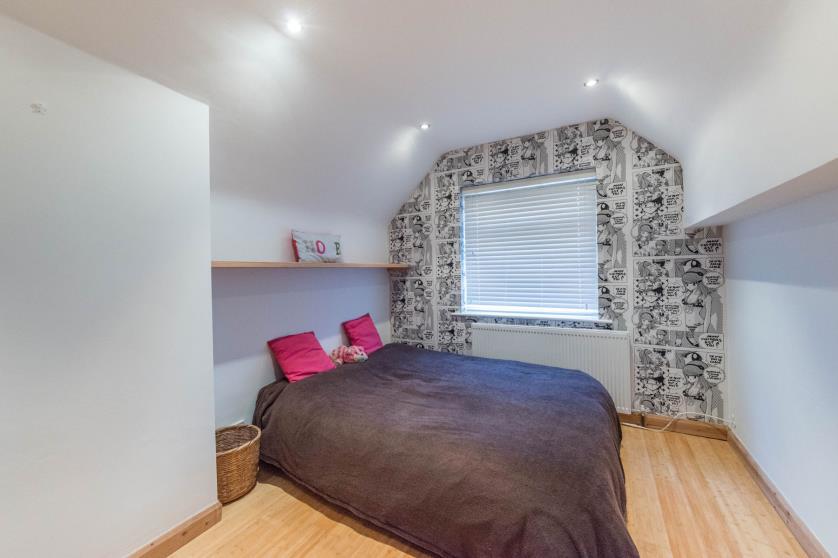 61m) A further good sized bedroom having a side facing upvc double glazed window, a central heating radiator, recessed lighting to the ceiling, eaves storage and bamboo flooring extends throughout