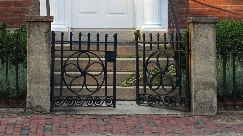 When considering the construction of a new fence, wall or gate, it should be designed to be compatible with the architectural character of the building type and style.