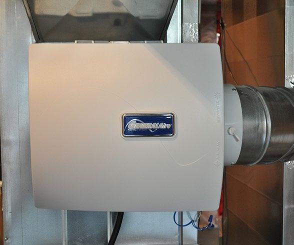 Figure 9 shows a central humidifier installed on the side of the furnace. During the summer months, when humidity is present in the outside air, switch the damper switch to summer.