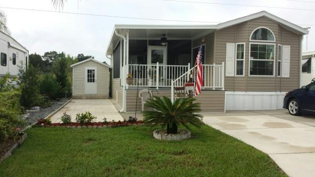 237 O'NEIL 12x40 PARK MODEL FOR SALE BY OWNER. 12x27 FLORIDA ROOM w/ FRONT PORCH & CARPORT. 2 BEDROOMS / 1.5 BATHS. 8x10 SHED. GOLF CART INCLUDED IN ASKING PRICE.