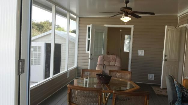 THIS PAINSTAKINGLY MAINTAINED AND SMARTLY IMPROVED, CHARIOT EAGLE PARK MODEL IS IN BETTER-THAN-NEW, MOVE-IN READY CONDITION WITH ITS ADDITIONAL DOUBLE CARPORT FOR A TOTAL OF THREE PROTECTED AND