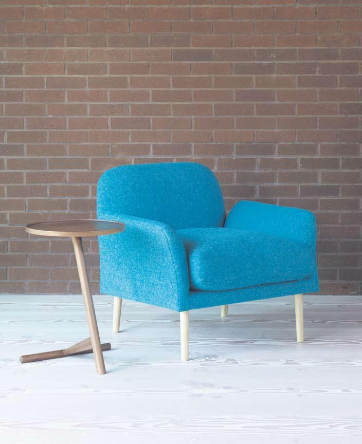 This playful occasional seating is upholstered in either knitted lamb s wool or woven double cloth.