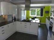 ENTRANCE HALLWAY REFITTED OPEN PLAN KITCHEN/BREAKFAST ROOM WITH BUILT-IN APPLIANCES AND GRANITE WORK SURFACES