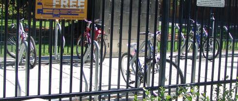 Sheltered, illuminated bicycle parking is especially helpful at all-day parking locations such as workplaces, transit stations, and schools,
