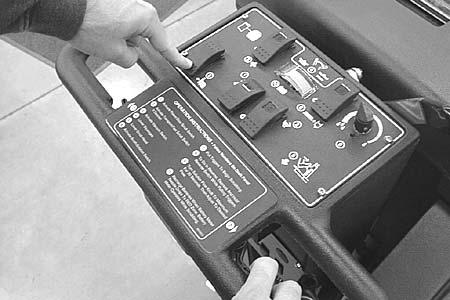 To operate in reverse, push and hold reverse switch while pulling triggers (Figure 3).. Periodically observe recovery tank for excessive foam (look through clear lid).