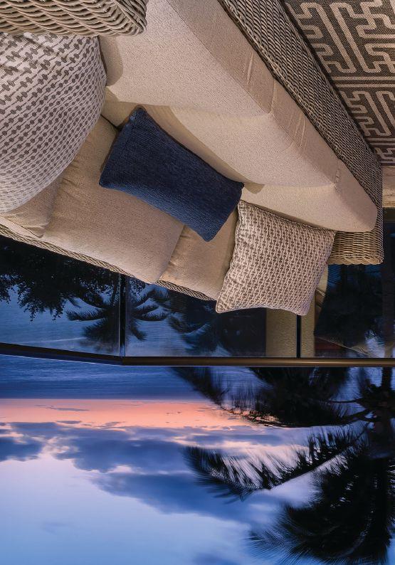 The residence features a soothing palette of greys, blues, and tans with the occasional pop of green to echo the Palm fronds and verdant Maui gardens surrounding the Montage.