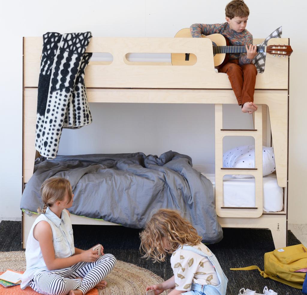 CASTELLO BUNK BED Streamlined Clean lines, coupled with cool curves and blonde wood. Round openings in the bed bases create a fun element for children.