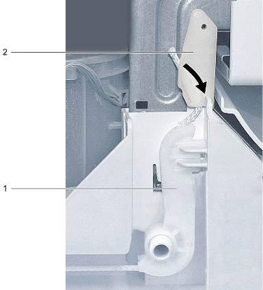 Insert tension cord to the spring (1) and fix it in the notch of the base pan (2). 1.