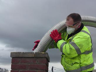 The FireFlexmaster chimney liner should then be pushed back up the chimney to the desired position.