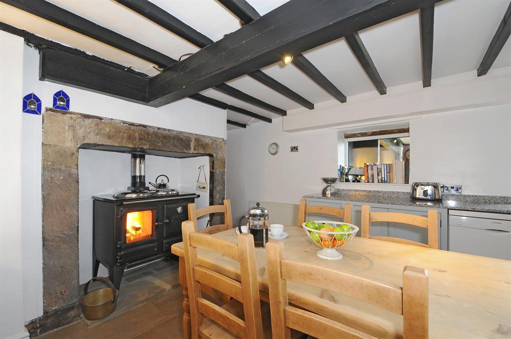 With the original parts of the property dating back to1640, a link- detached (partially attached on one wall only) family sized property of stone construction set under a pitched stone slate roof and