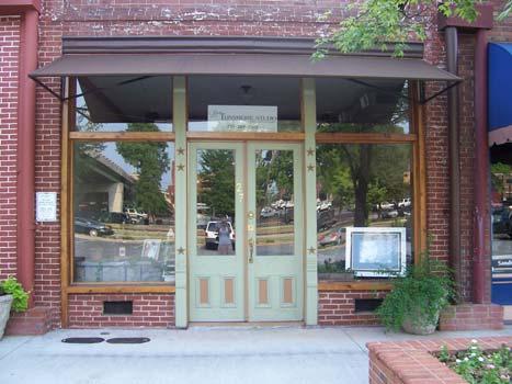 Entrance doors on historical commercial buildings usually have a larger clear glass panel and are made of wood, steel, or aluminum.