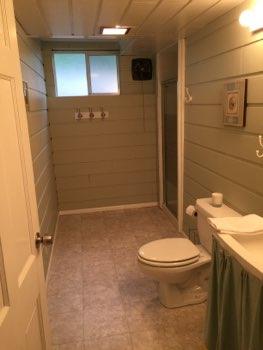 1. Room Basement Bathroom Ceiling and walls are in good condition overall. Accessible outlets operate.