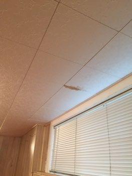 Loose paneling Water staining at the ceiling
