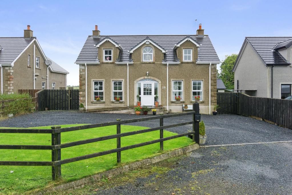 This attractive recently built detached home occupies an excellent position with wonderful views over the Countryside.