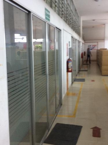Provide a minimum 2-hr firerated exit corridor between the