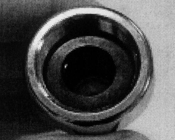 * Push the pipe into the smaller hole of the connector supplied in the adaptor kit. The pipe should be held firm (Fig.F) * Place the threaded tap connector over the long part of the brass flange.