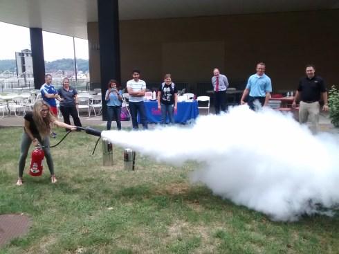 In order to familiarize one with a fire extinguisher, participants were given the opportunity to extinguisher a live fire with a water mist or