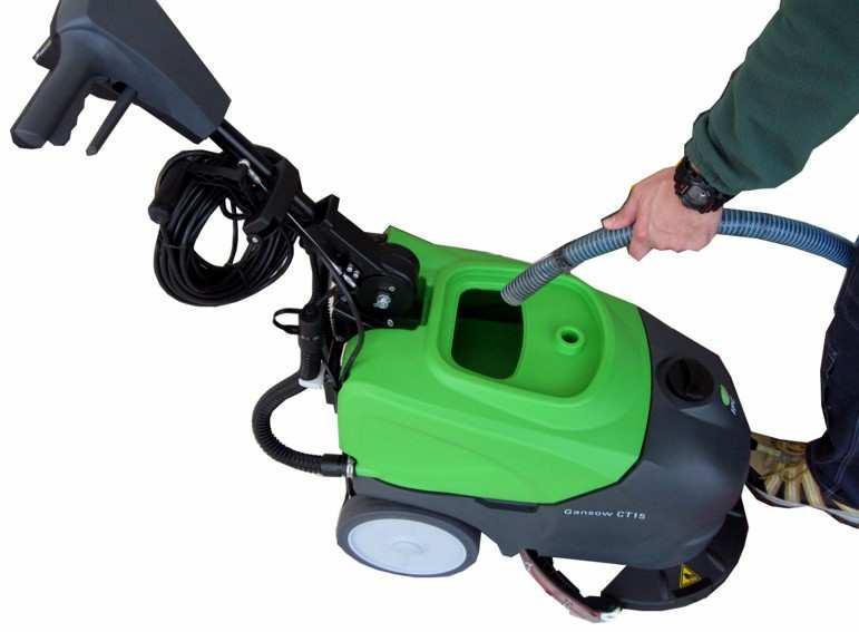 To recharge the batteries, plug in the battery charger (OPTIONAL) using the extension provided with the machine.