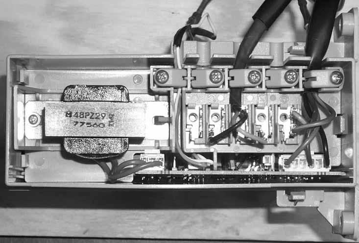 Note: When servicing the inverter, it is important to dress the wiring to keep lowvoltage DC wiring and 0 VAC wiring separate.