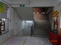 For the 2 story RCC production building, openings were discovered in the stairs without p Photograph: i) Collapsible gate in the 6 storied main production building.