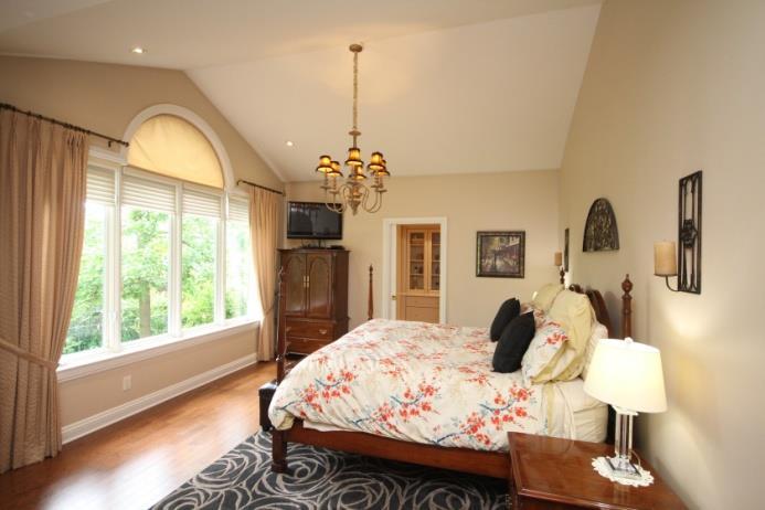 The Master Bedroom An arched entry leads you to the master bedroom is