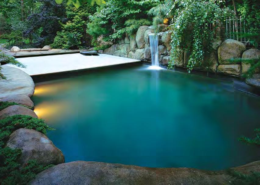 A CUSTOM POOL DESERVES A CUSTOM-DESIGNED SYSTEM Extreme-cantilever pool with rock features and waterfall Our company installs automatic pool covers throughout Arizona.