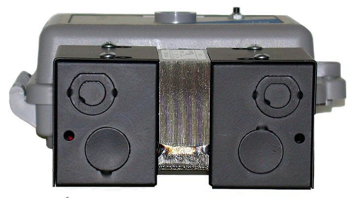 Line voltage side of enclosed transformer. NOTES: 1. Enclosed transformer shown in this photo is an optional accessory. 2. Conduit stubs shown in this photo are not supplied.