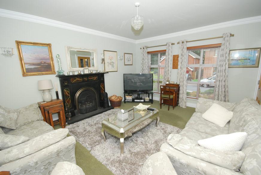 The Property Comprises: ENTRANCE HALL: Ceramic Tiled Floor, upvc panelled front door and double glazed side panels, walk-in cloak/storage cupboard.
