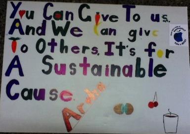 Then we decided on a sign to put beside/on top of our Community Free Fruit,