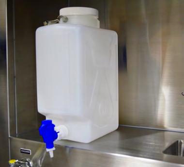 WALL-MOUNTED FORMALIN SPIGOT Conveniently store and