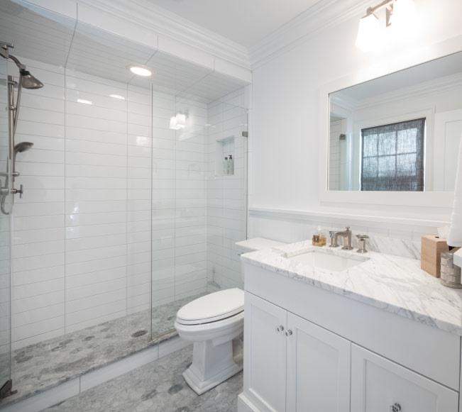 Savor the luxury found in the Master Bedroom Suite featuring a tray ceiling, large windows with views of the lush grounds and a private dressing room with a full wall of custom cabinetry assuring the